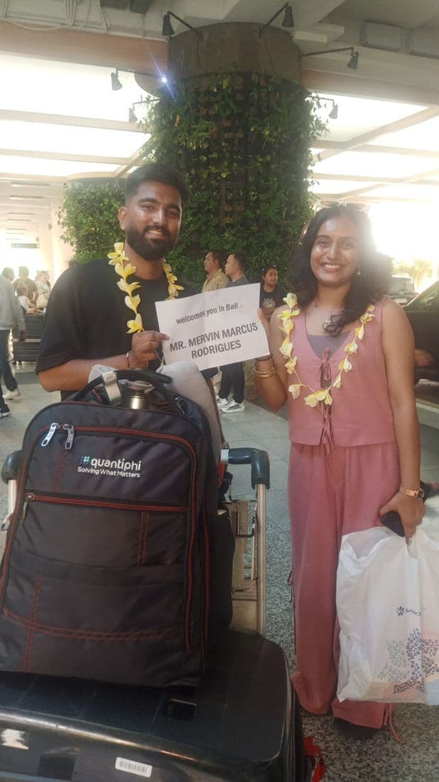A family travelling with Trripah, welcomed at Bali airport with flower garlands