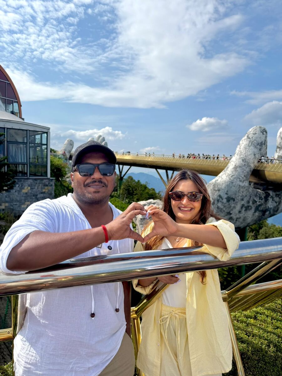Honeymoon couple at the Golden Bridge, Ba Na Hills, Da Nang